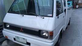 2003 Mitsubishi L300 drop side