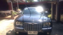 Chrysler 300C and Fortuner 2.7G