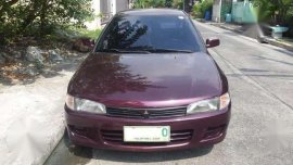 Mitsubishi Lancer 99 GL Pizza Pie Maroon Manual