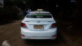 Taxi 2012 Hyundai Accent with franchise til 2019
