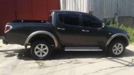 2012 Mitsubishi Strada 2005 mitsubishi Montero 20 prcnt dwn