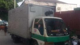 Isuzu Elf NKR Giga 4HF1 6W 14ft aluminum closevan.