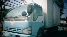1146 #9 Isuzu Elf Aluminum Closed Van Truck