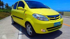 Yellow car Chana Benni 2008 model year. 1.3 L gas. Manual. Local.