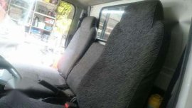 2004 Isuzu Elf 6-Wheeler Dropside Truck