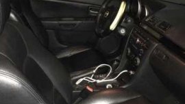 Selling Mazda 3 2007 2.0 model silver grey top model with sun roof