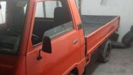 Well maintained Mitsubishi L300 Dropside Gas 1998 RED color for sale