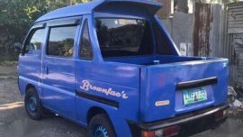 Blue Suzuki Multicab