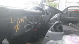 1119 #4 Isuzu Elf Dropside Cargo LM Truck