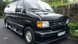 Ford E150 chatue auto