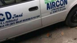 2003 Toyota Corolla with taxi franchise