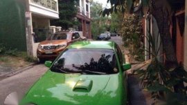 Mazda 323 Model 1998 Green for sale