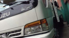 284 SURPLUS JAPAN NPR ISUZU 16ft. Dropside 6stud 4HE1 turbo