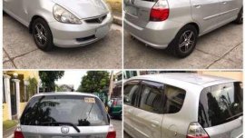 Toyota Corolla GLi 93 MT and Honda Jazz Local 1.3 AT 2004