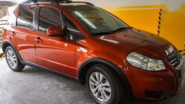 Suzuki SX4 2014 Acquired AT Orange For Sale