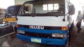 Isuzu Elf 14ft drop side with lifter