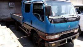 Canter Dropside 4d33 double cab giga