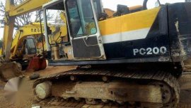 komatsu backhoe pc200-5 with breaker line