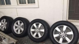 Nissan armada Pull out rims 20 with NEW Nitto terra grappler 305 55 20