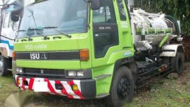 Isuzu 8PD1 Tanker Truck and Isuzu Elf Water Tanker