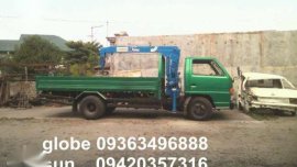 isuzu boom elf truck 2.5 toners and 10pd cargo 5 tons boom double diff