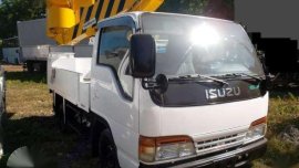 Isuzu Elf Manlift and Mitsubishi Forklift 5 tons