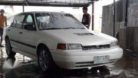 Mazda 323 1996 MT White For Sale
