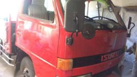 Isuzu Elf Nkr. 14" dropside.