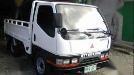 For sale Dropside Mitsubishi trucks 