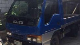 For sale Isuzu Elf mini dump truck