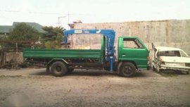 Isuzu 12 Feet Elf boom 2.2 tons