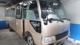 2013 Toyota Coaster Gliding Door Dubai Version (Beige)