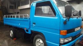 ISUZU NKR 4BE1 4W dropside 10ft Metal Flr 