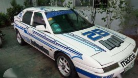 Mazda Astina 1.3 MT White For Sale