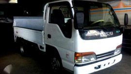Isuzu Elf 6-Wheeler Dropside White MT 
