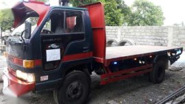 Isuzu Elf 150 14 Ft Red MT For Sale