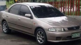 Mazda Familia 2000 1.3Li Carb Beige MT 