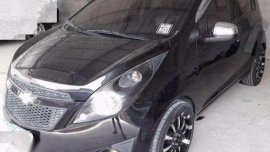 Chevrolet Spark 2012. Top of the Line. Automatic. Black. P328T