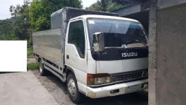 isuzu elf dropside 4hf1 16ft.
