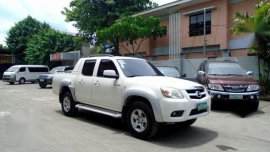 2009 Mazda BT-50 528t Nego (Kotsemar) vs Navara Strada