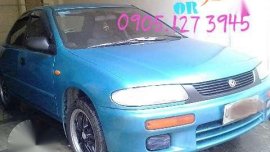 Metallic Blue Mazda Familia 323 96 Mdl