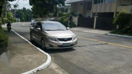Toyota Corolla Altis V 2010 AT Silver For Sale