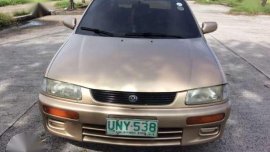 97 Mazda familia 323 rayban matic