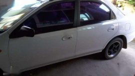 Mazda 323 1999 (seagull emblem)