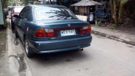 Mazda 323 GLXi 98 Model Rayban