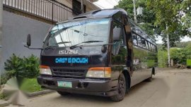 Isuzu Elf Minibus 4HF-1 Black MT For Sale