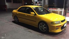 Mazda Familia 323 1997 Yellow AT For Sale