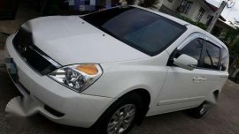 Kia Carnival 2013 2.9 MT White Van For Sale