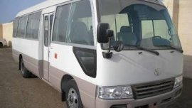 Almost brand new Toyota Coaster Gasoline