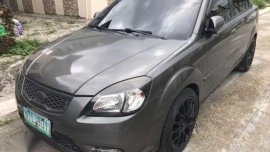 Fresh Kia Rio 2010 AT Gray Sedan For Sale